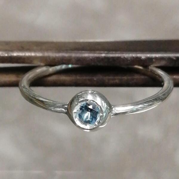 Anello Cippino in argento e topazio azzurro