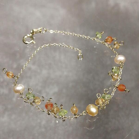 bracciale Estate minimal in argento dorato e perle,citrini e peridoti