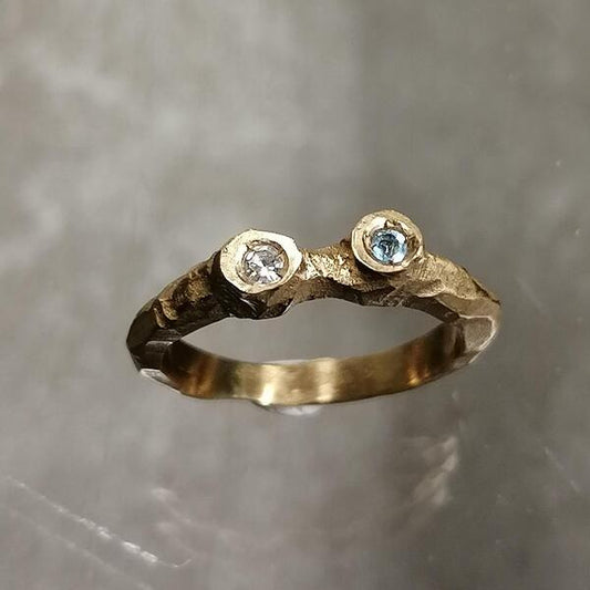Anello Ere in bronzo con diamante e topazio azzurro
