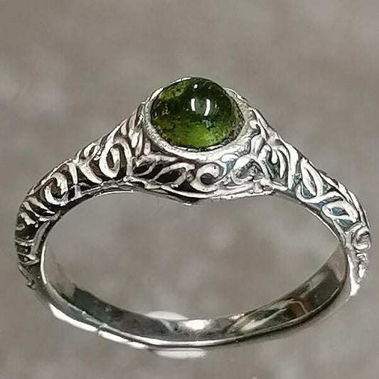 ANELLO RIO IN ARGENTO E PERIDOTO MM 0,5 MIS 18