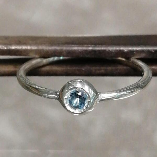 Anello Cippino  in argento e topazio azzurro