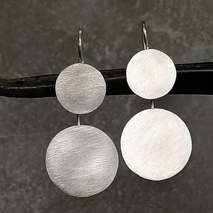 Orecchini  artigianali Millò in argento  925 satinato. fatti a mano