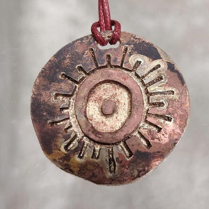 ciondolo Sole Eterno in bronzo rosso