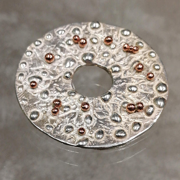 ciondolo artigianale Universo in argento 925 e rame puro