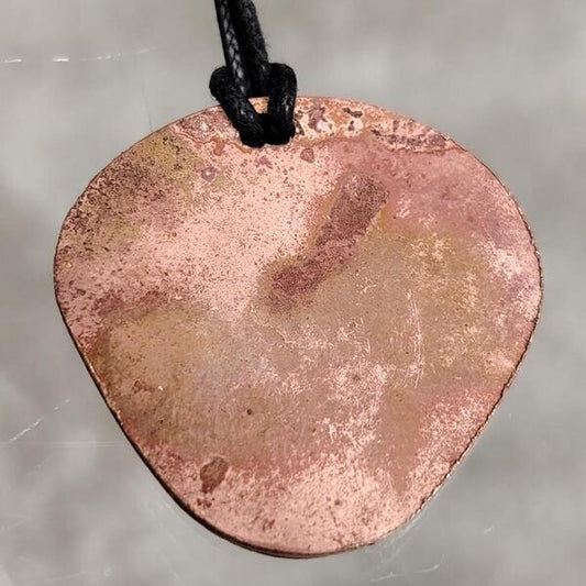 ciondolo artigianale Triskell in bronzo rosso